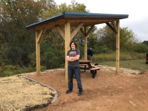 An Eagle Scout added a shelter to a picnic table and landscaping.